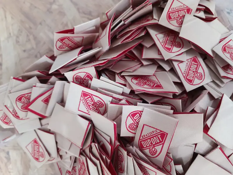 Red woven Brasserie Dupont labels