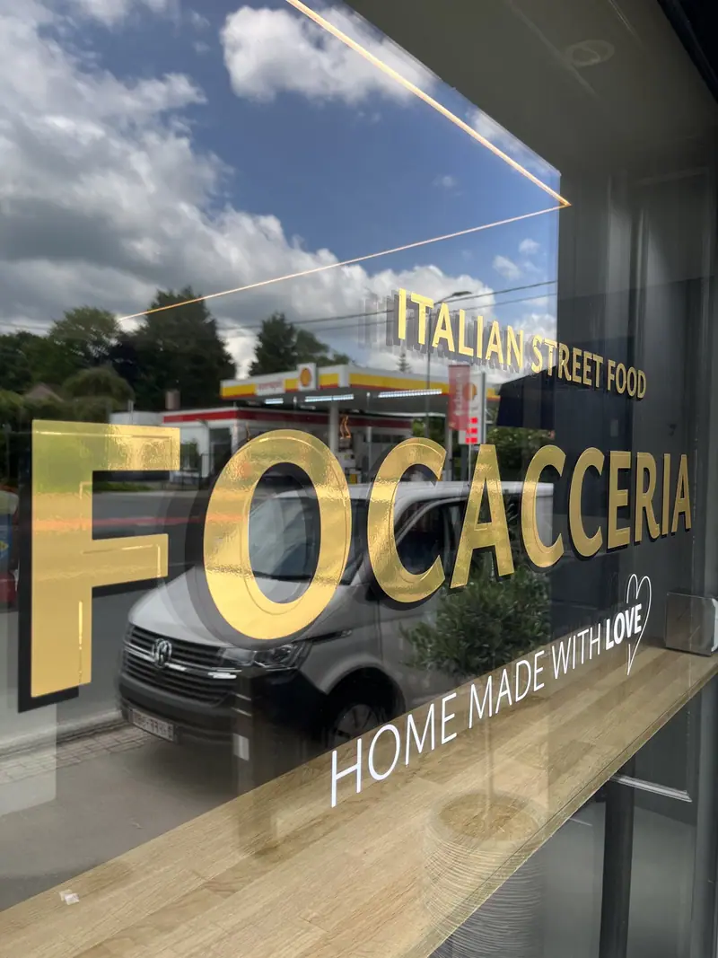 Gold FOCACCERIA lettering on the Casa Gallo window