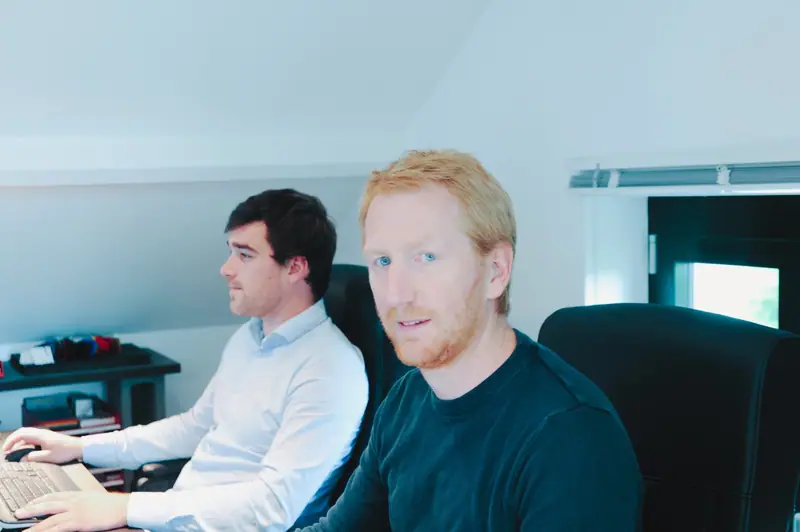 Thomas Dekaise and Martin de Wael at the office