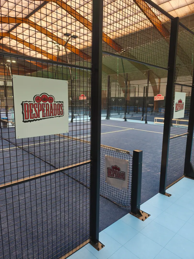 Desperados panels around a covered padel court