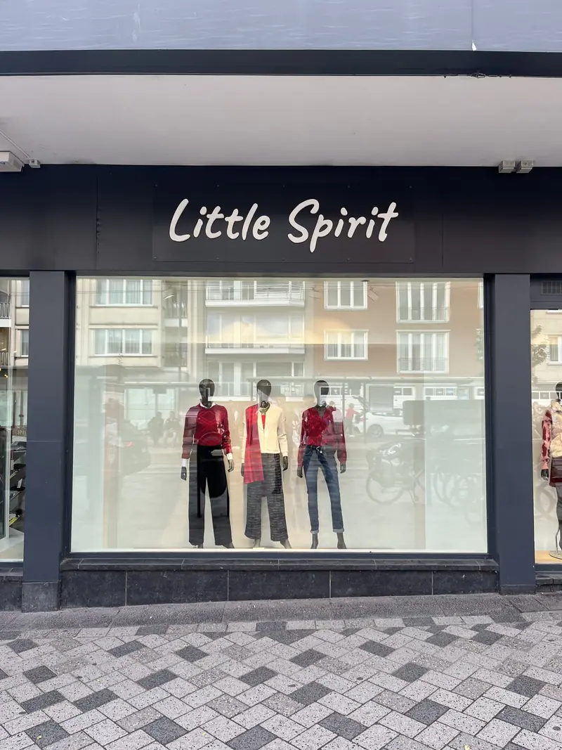 Little Spirit shopfront with white letters on a black background