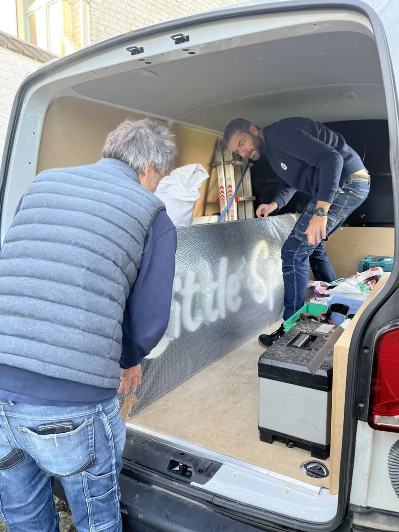 Fitting the Little Spirit letters from the workshop van