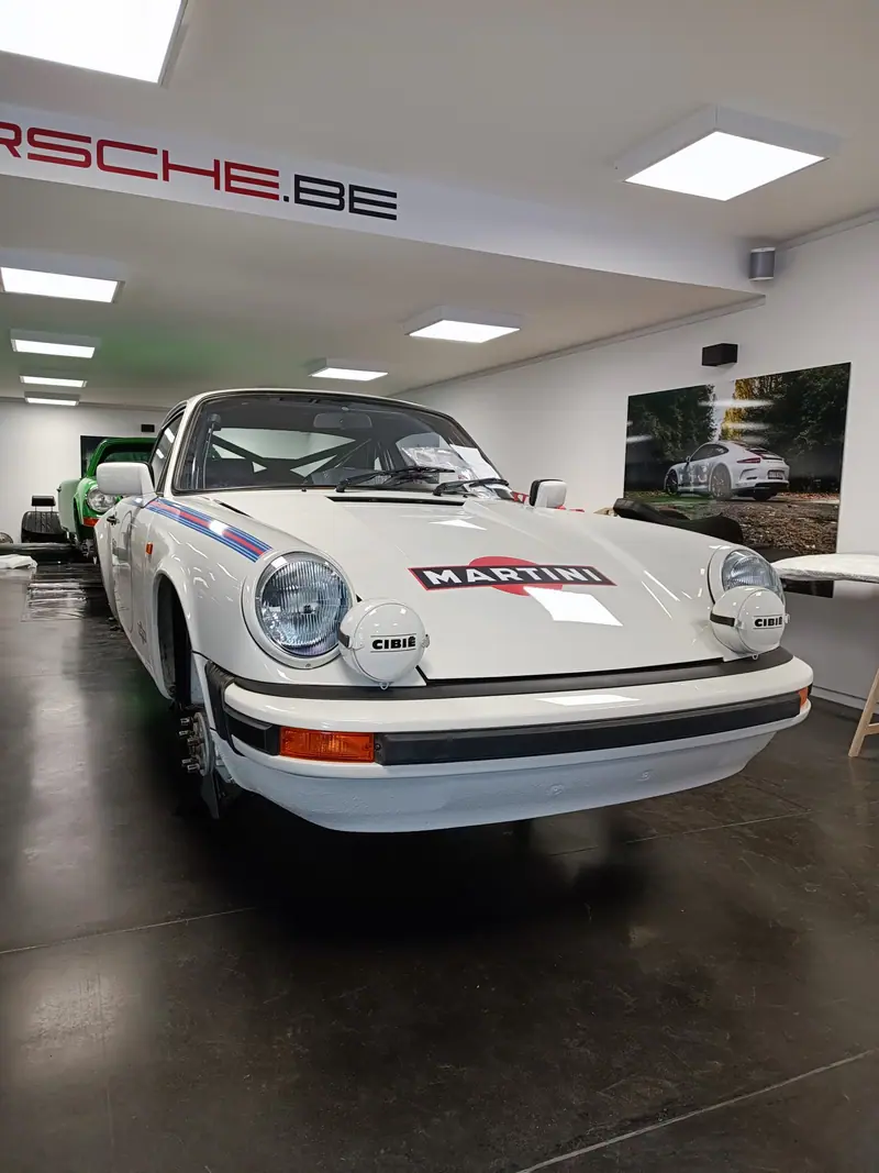 White Porsche with Martini stripes and logo